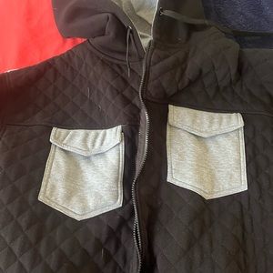 Nice warm gently used black and grey lumber jacket